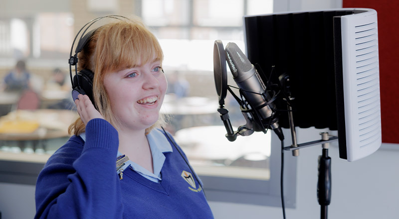 Cerdon College Merrylands student inside audio booth