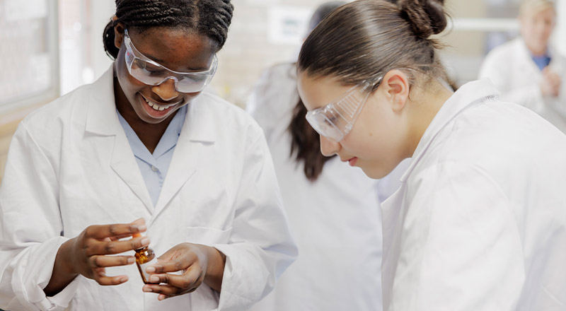 Students from Cerdon College Merrylands conducting science experiment